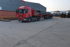 Scania Articulated truck with a flatbed trailer