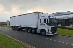 Axtra-Export-Logistics-Palletline-Volvo-Truck-with-curtainsider-trailer