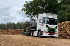 Carter-Haulage-Scania-with-low-loader-carrying-logging-vehicle