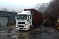 Clark Transport Ltd MAN Flatbed Trailer loaded with pallets