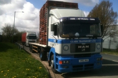 Clark Transport Ltd MAN Truck flatbed trailer with pallets