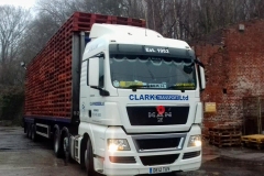 Clark Transport Ltd MAN with flatbed trailer carrying pallets