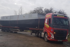 Hutchinson Engineering Services Volvo FH Low loader trailer with canal barge on trailer