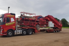 Hutchinson Engineering Services low loader carrying farm equipment
