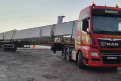 Hutchinson MAN with rear steer trailer carrying heavy steelwork