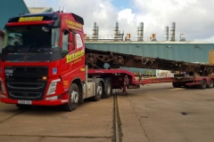 Hutchinson Volvo FH with Train Chassis on heavy haulage trailer