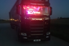 JBS-Transport-Scania-V8-with-curtainsider-night-image-with-V8-Super-lights-in-cab