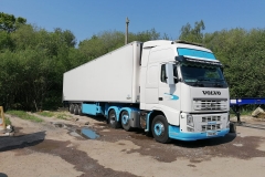 JamJar-Transportation-and-Logistics-Volvo-truck-with-container-trailer