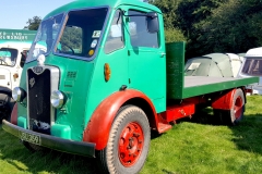 Vintage-Guy-flatbed-Truck-scaled