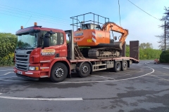 PJC Plant Services 8 Wheel Scania low loader with Digger Loaded