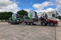 SC-Crane-assisted-Haulage-Volvo-rigid-flatbed-with-trailer-loaded-with-cable-reels